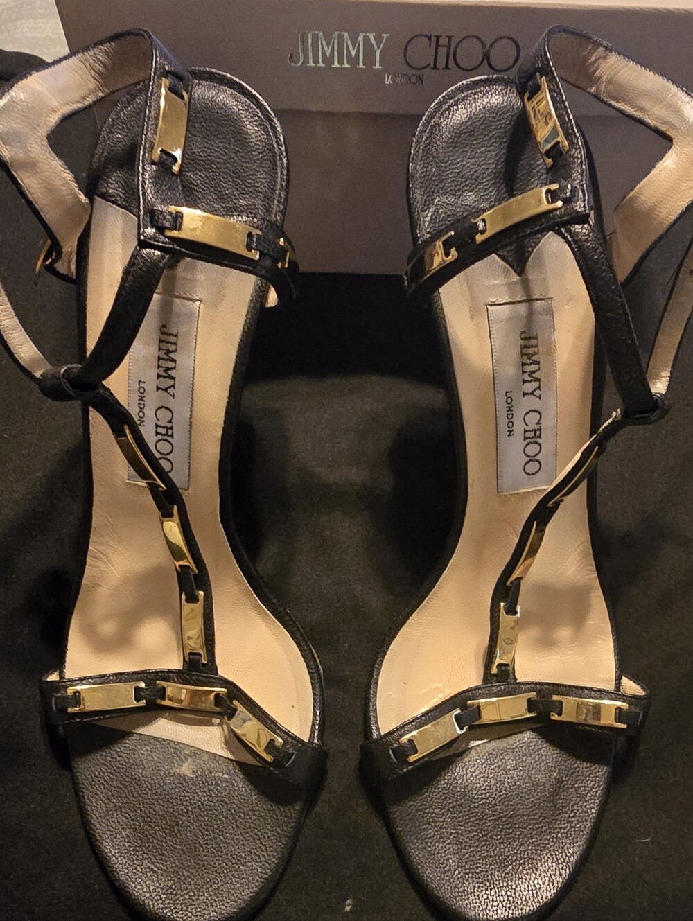 Jimmy Choo Black Leather T-Strap Sandals with Gold Hardware